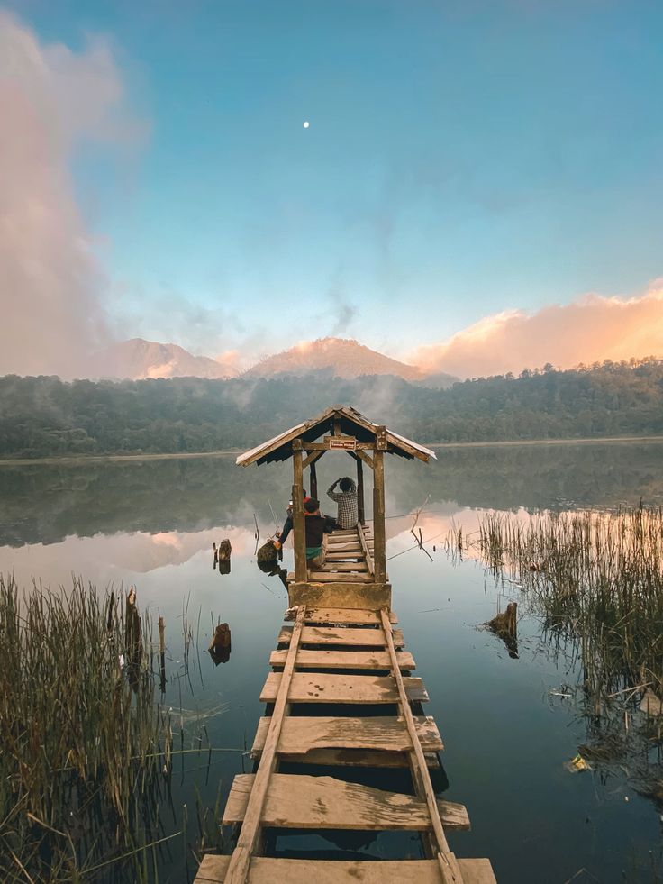 Misty morning at Danau Taman Hidup, the mystical lake along the Mount Argopuro descent to Bremi